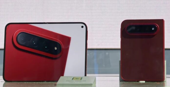 430097 Xiaomi 18 Fold foldable phone in a red finish with a large Leica-branded rear camera module.