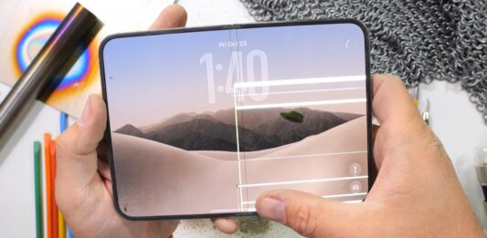 JerryRigEverything’s iPhone Duo Test Raises Questions About Dust and Foldable Display Durability Apple iPhone Duo foldable phone shown open with its large inner display visible.